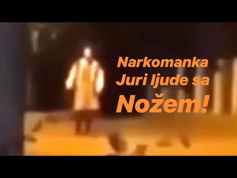 Luda Baba Narkomanka odevena u narodnu nošnju juri ljude i igra oko njih!!!